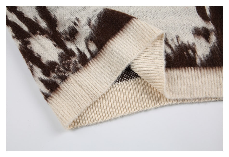 Close-up of the ribbed hem folded back, showing the inside of the knit.