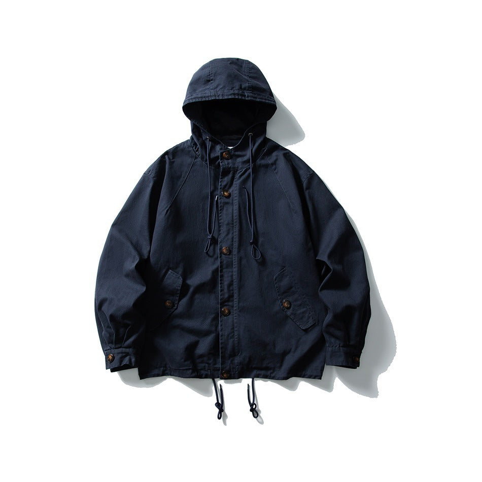 Navy hooded jacket flat lay with button front, flap pockets, drawstring hood and drawstring hem