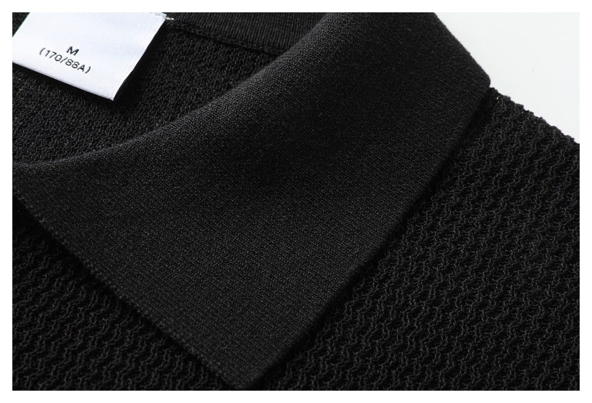 Close-up of the black polo's smooth collar beside its textured knit and size label marked M (170/88A).