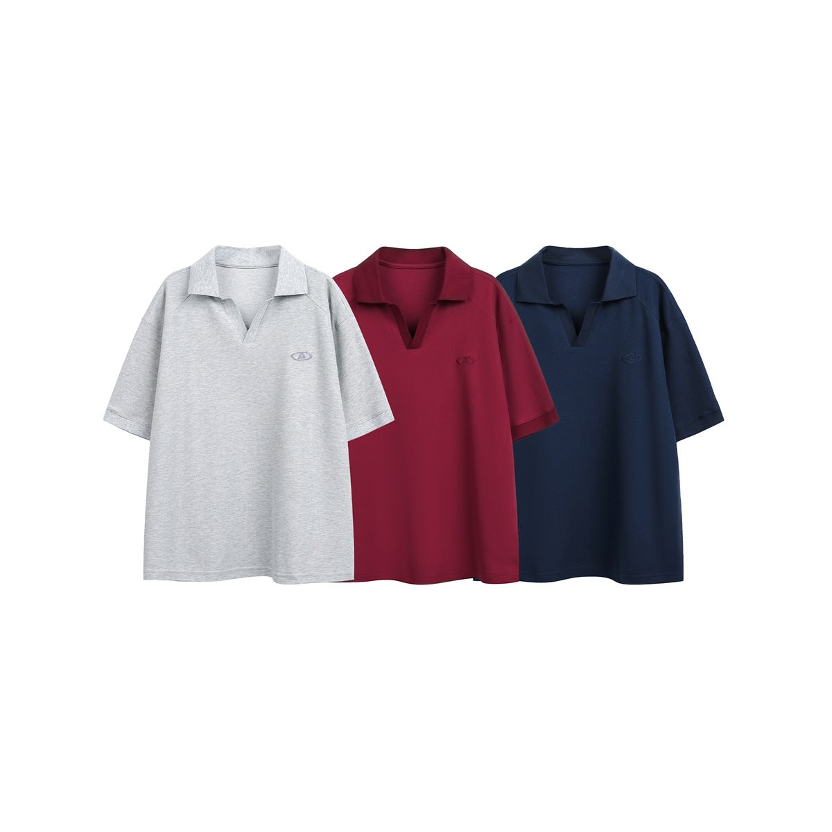 Three short-sleeve polo shirts with open collars in light gray, burgundy, and navy, shown from the front.