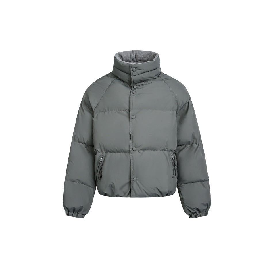 Rock gray quilted puffer jacket with stand collar, snap front, side zip pockets and elastic cuffs, flat front view