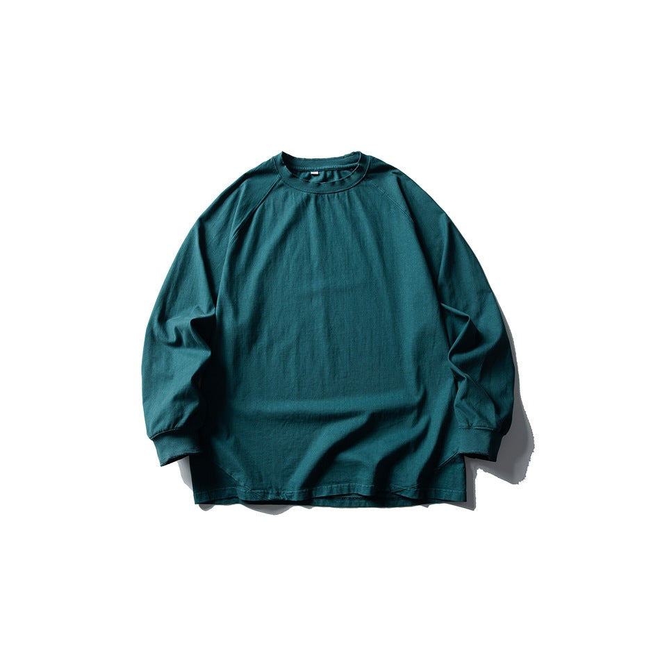 Peacock blue long-sleeve raglan crew-neck T-shirt flat lay, front view