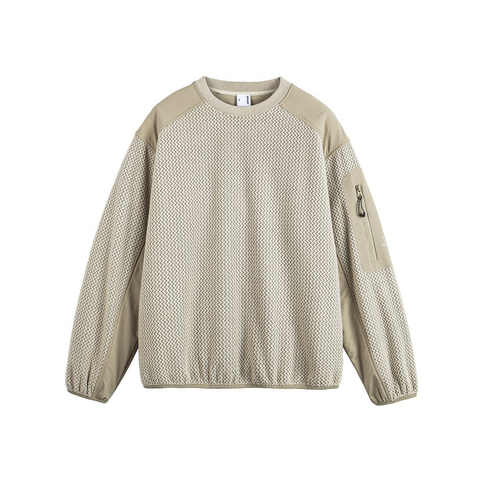 Khaki crew neck sweatshirt with zigzag textured body, smooth shoulder panels and a zippered sleeve pocket, flat front view