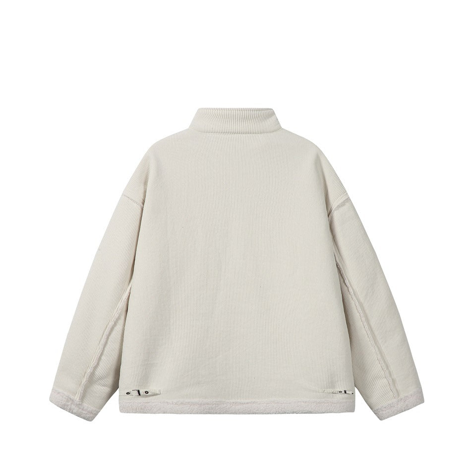 Back of a flat-laid cream jacket with a high collar, contrast seams, and pale trim at the cuffs and hem.