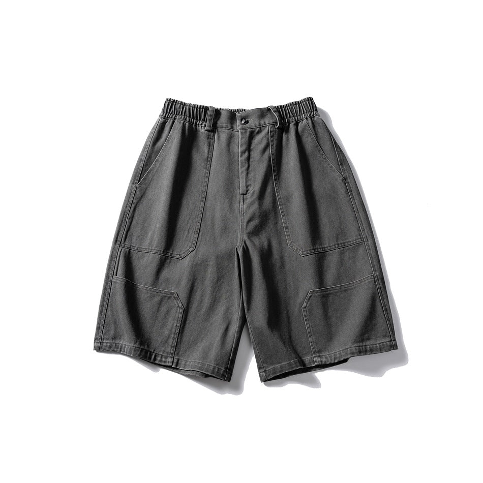 Gray knee-length shorts flat lay front view with elastic waistband, button and large patch pockets