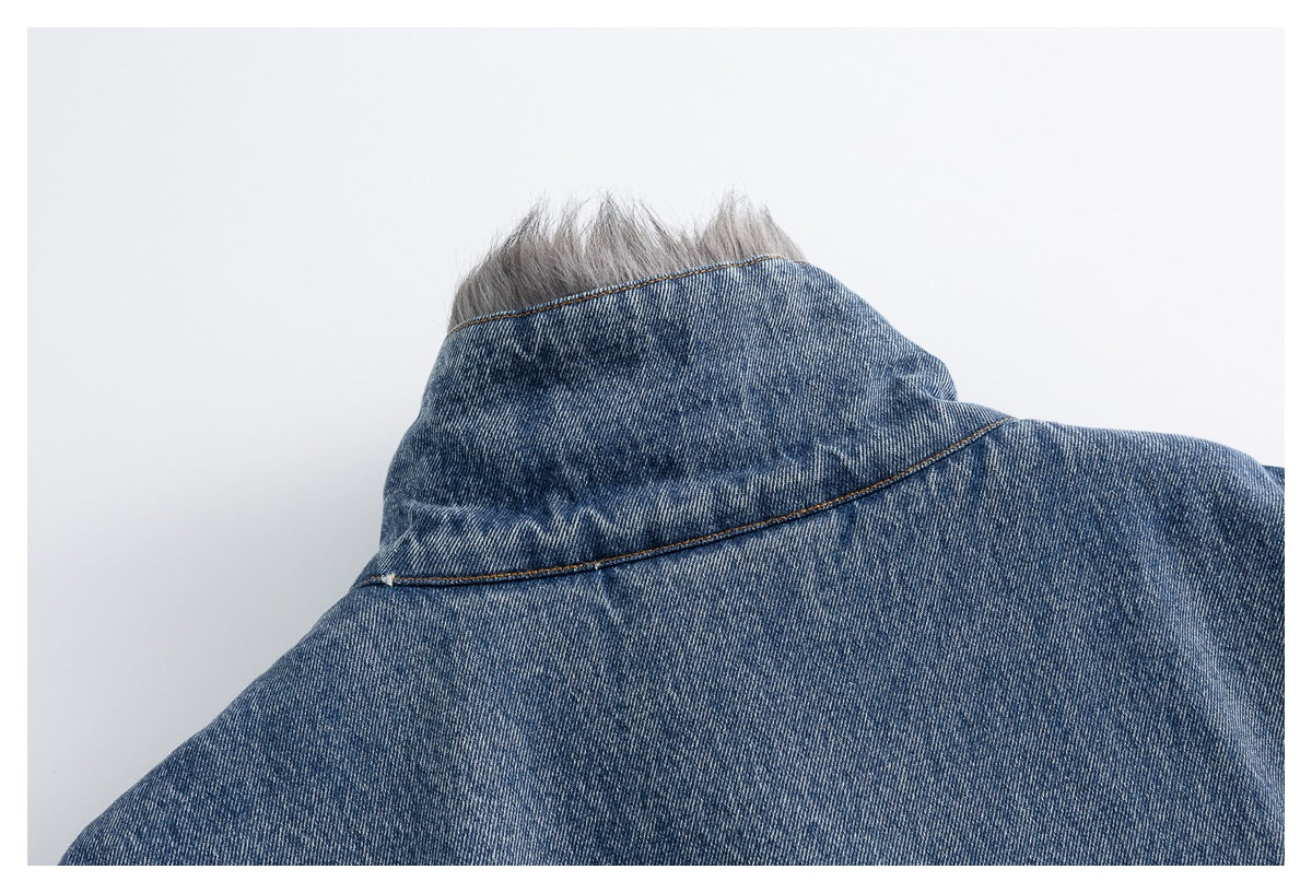 Close-up of the blue denim jacket collar with gray fur lining peeking over the top.