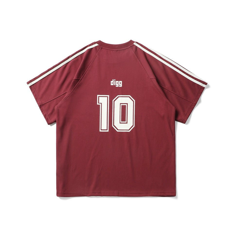 Burgundy short-sleeve shirt shown from the back, with white shoulder stripes, “digg” lettering and a large outlined 10.