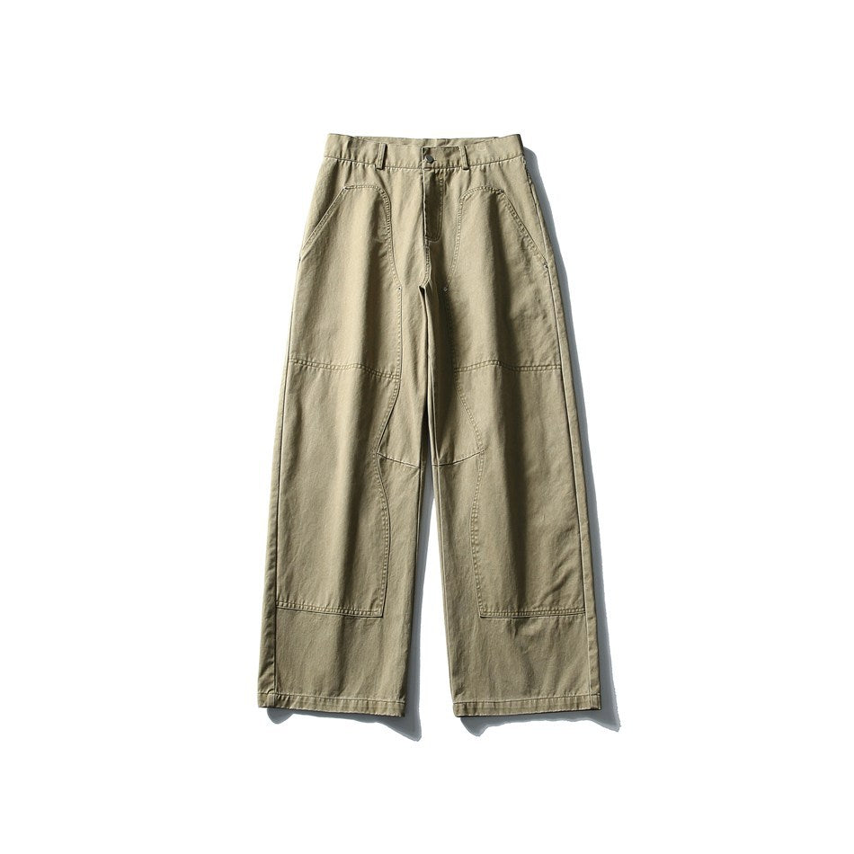 Front flat lay of khaki wide-leg pants with knee panel overlays and contrast topstitching