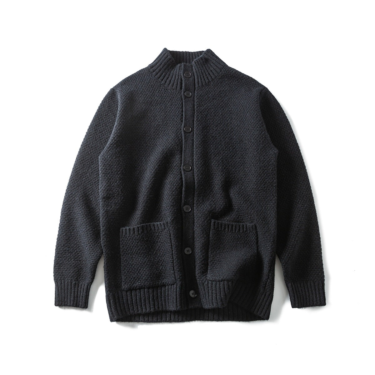 Black knit button-front cardigan with ribbed stand collar, two patch pockets and ribbed cuffs and hem, flat lay
