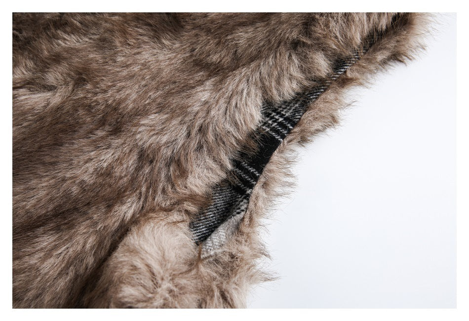 Close-up showing brown faux fur beside a narrow section of black-and-gray plaid lining.