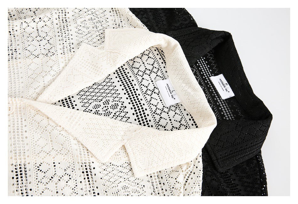 Close-up of cream and black openwork shirts showing their collars, patterned fabric, and sewn-in labels.
