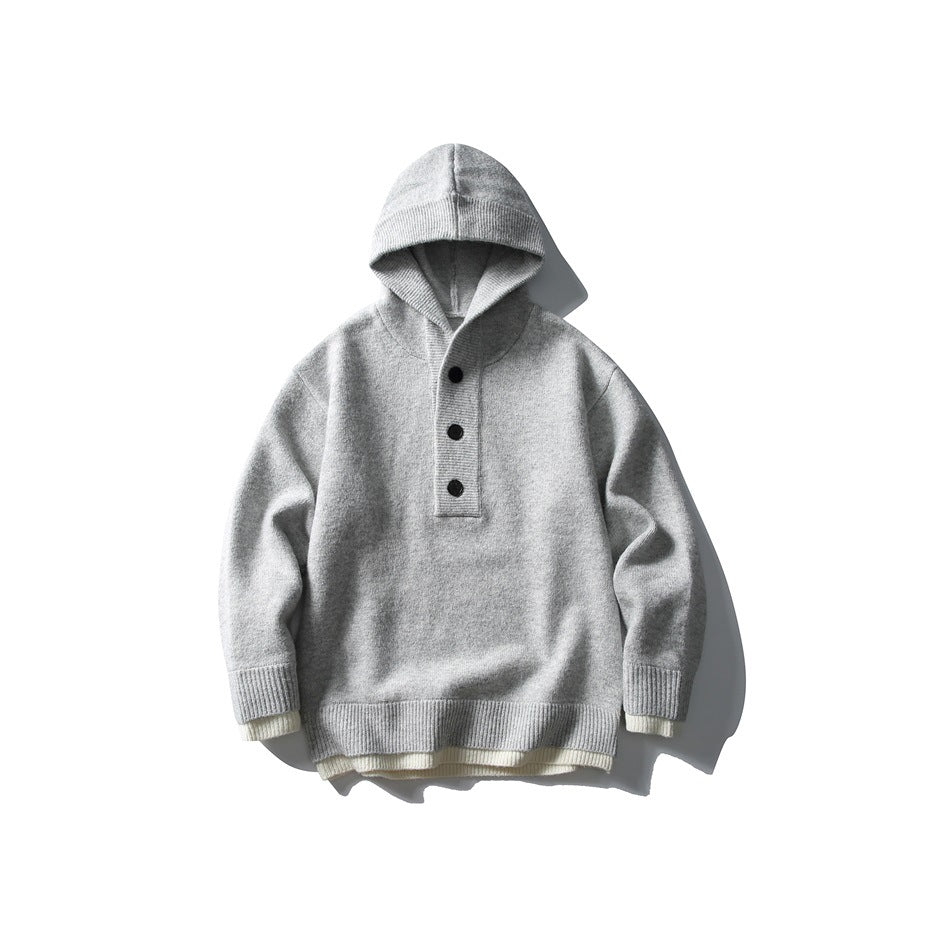 Light gray hooded knit sweater with three-button placket and cream layered hem trim, flat lay