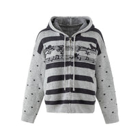 Gray knit zip hooded cardigan with charcoal stripes, music-note jacquard band and dotted sleeves, flat front view