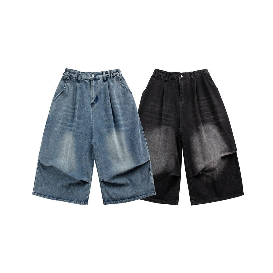 Front view of wide-leg denim shorts in blue and black, displayed side by side.