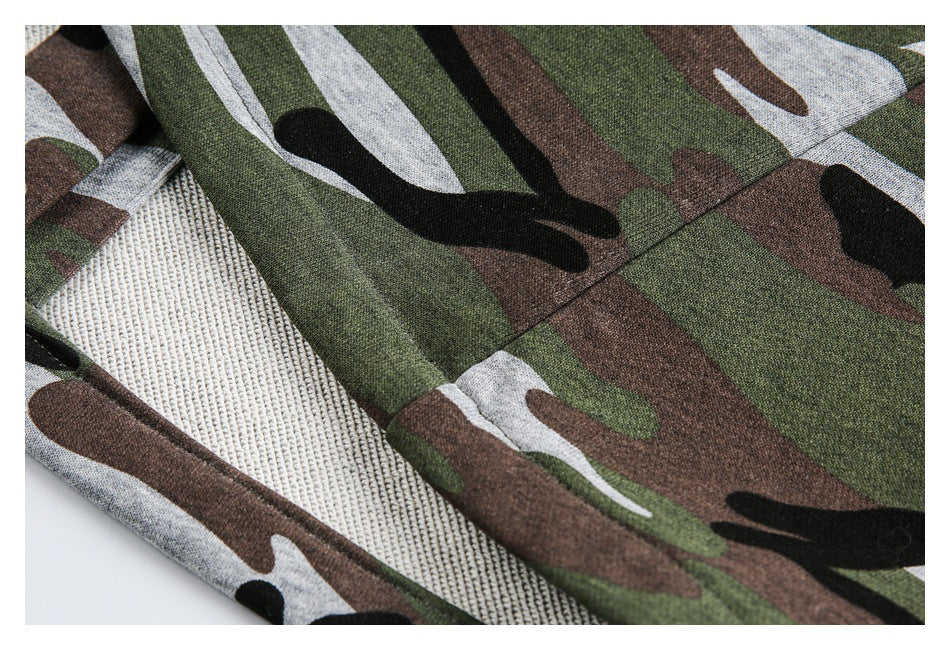 Close-up of the camouflage pants’ interior seam and exposed textured fabric section.