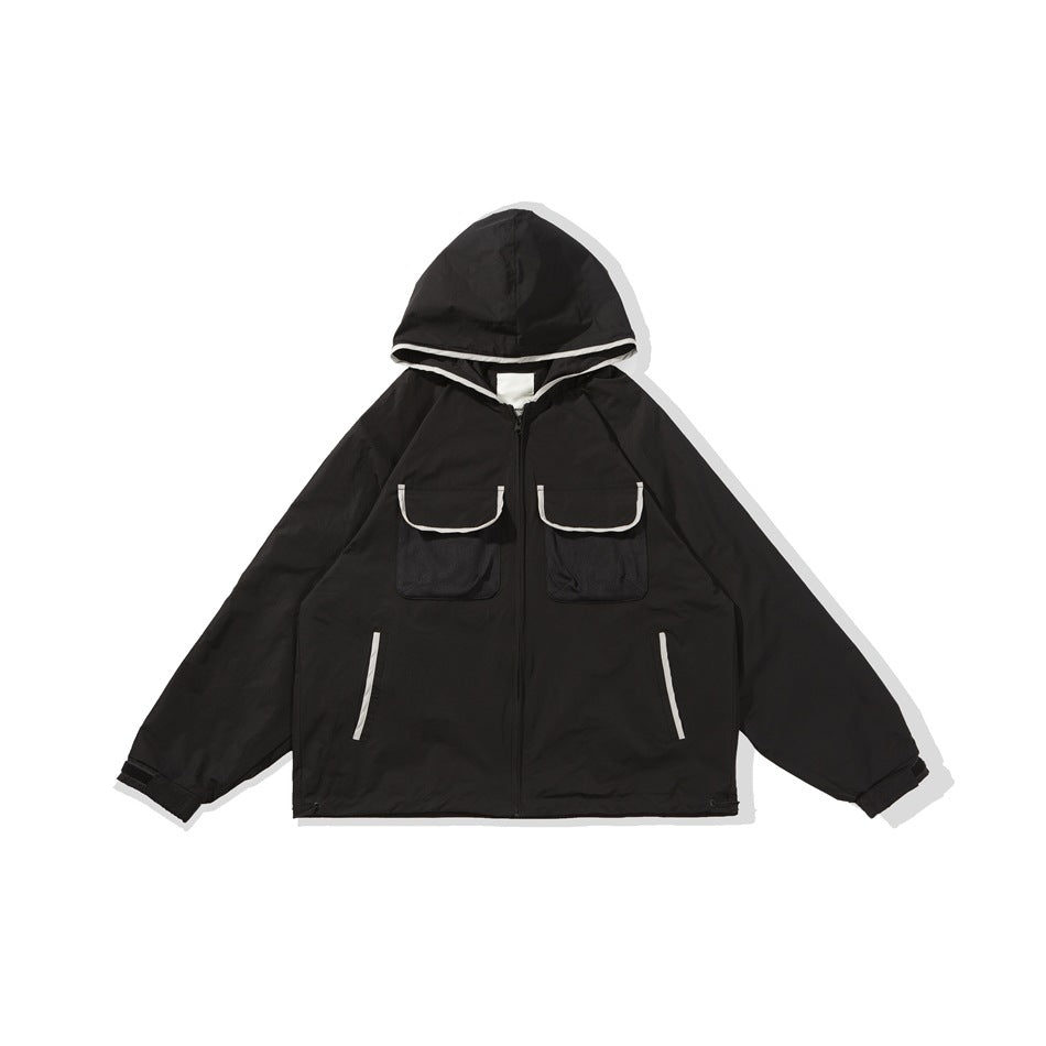 Black hooded zip jacket flat lay with chest flap pockets, gray trim and cuff tabs