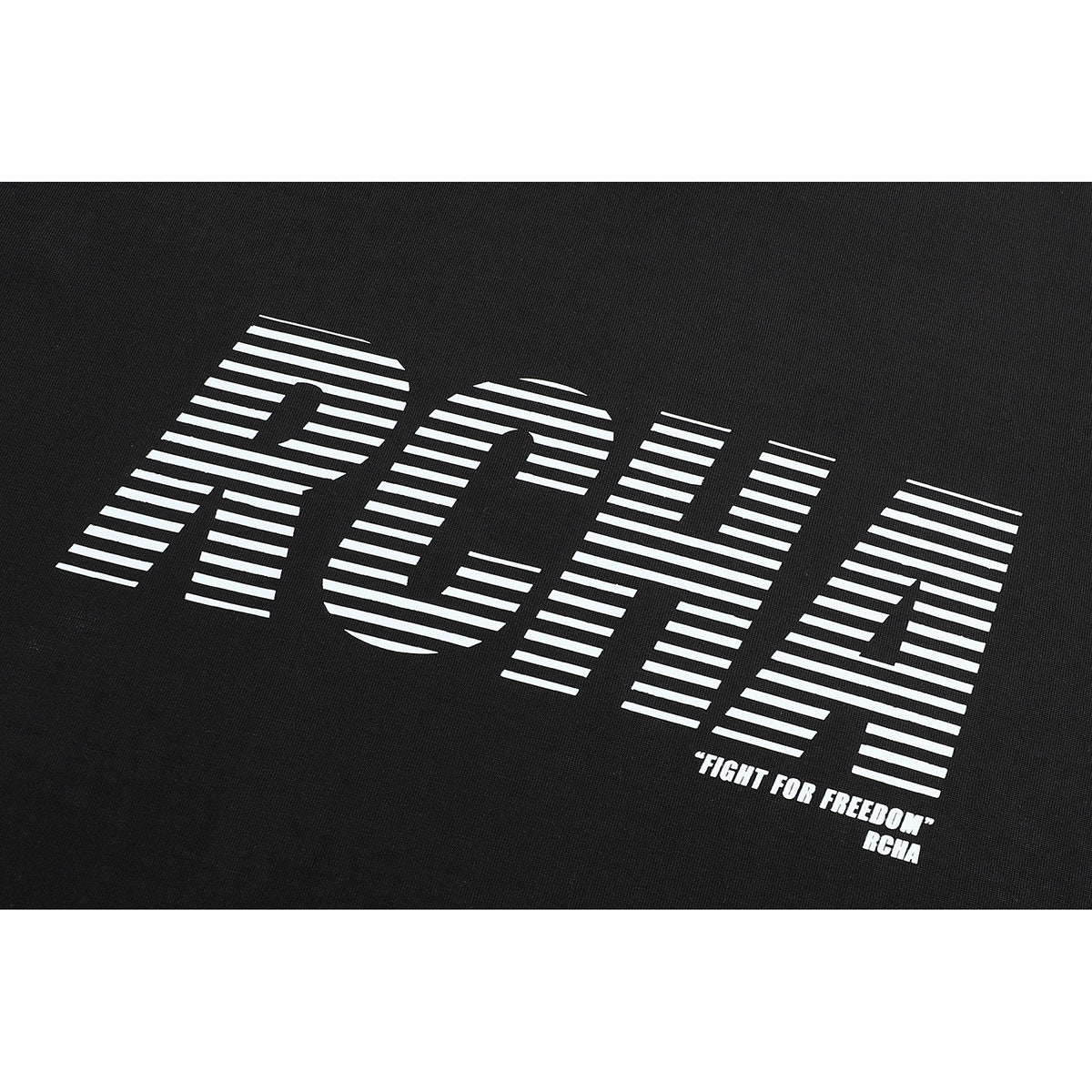 Close-up of a white striped graphic and small English text printed on black T-shirt fabric.