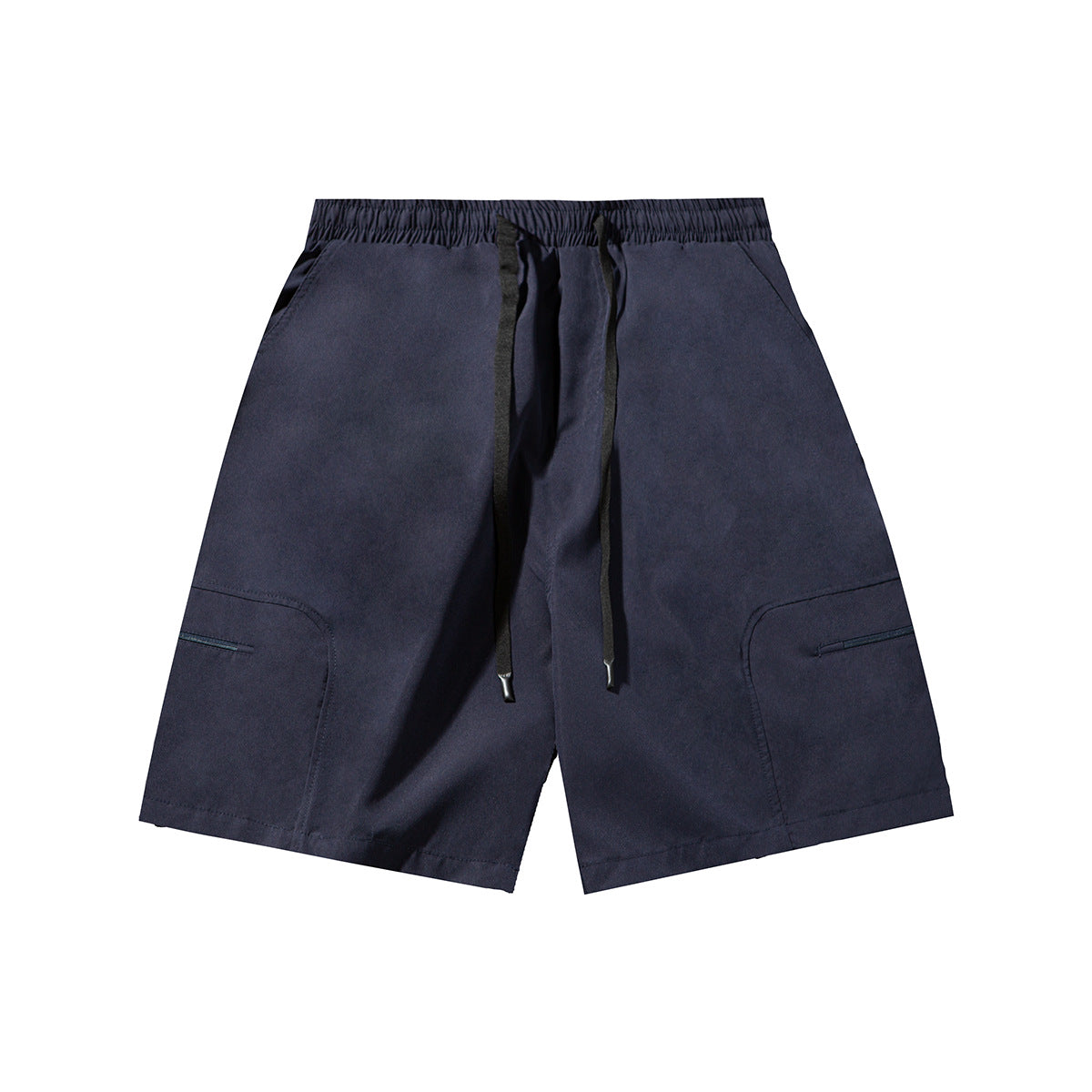 Navy drawstring shorts with elastic waistband and angled zip-detail side pockets, flat front view