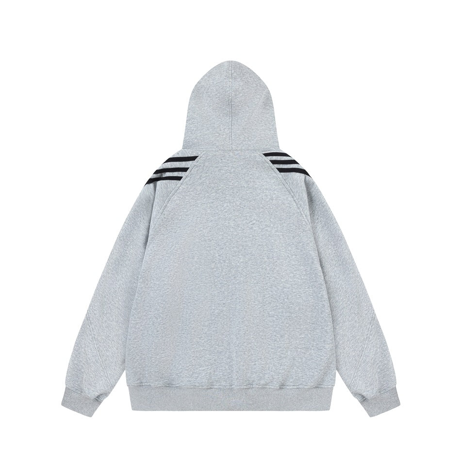 Back view of a light gray hooded sweatshirt with black shoulder stripes and ribbed cuffs and hem.