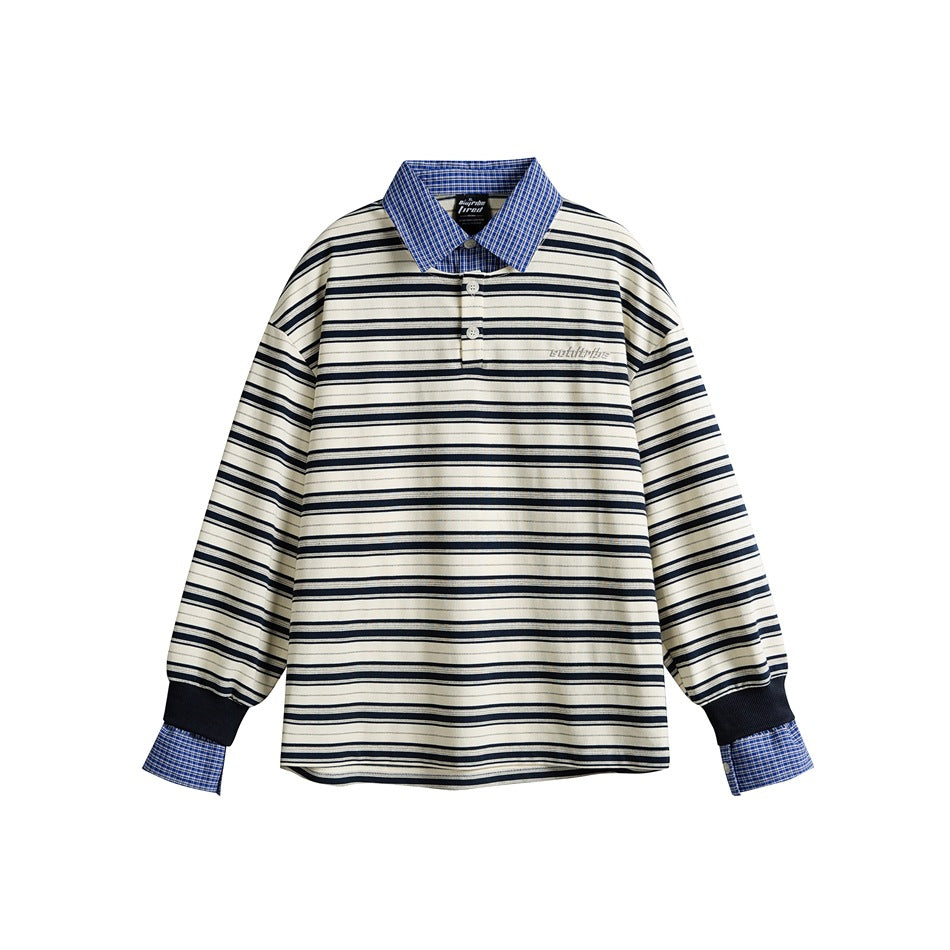 Navy and cream striped long-sleeve polo with blue plaid collar and cuffs, flat front view