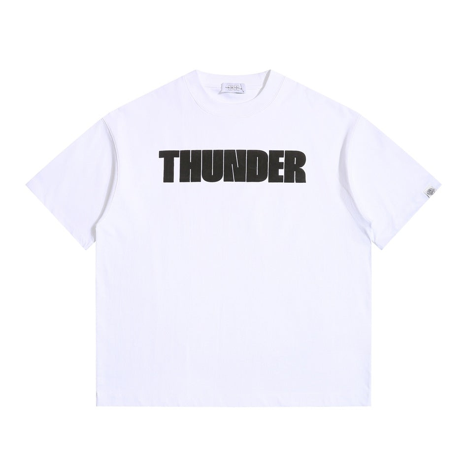 White short-sleeve crew-neck T-shirt with large black THUNDER block-letter print on chest, flat lay