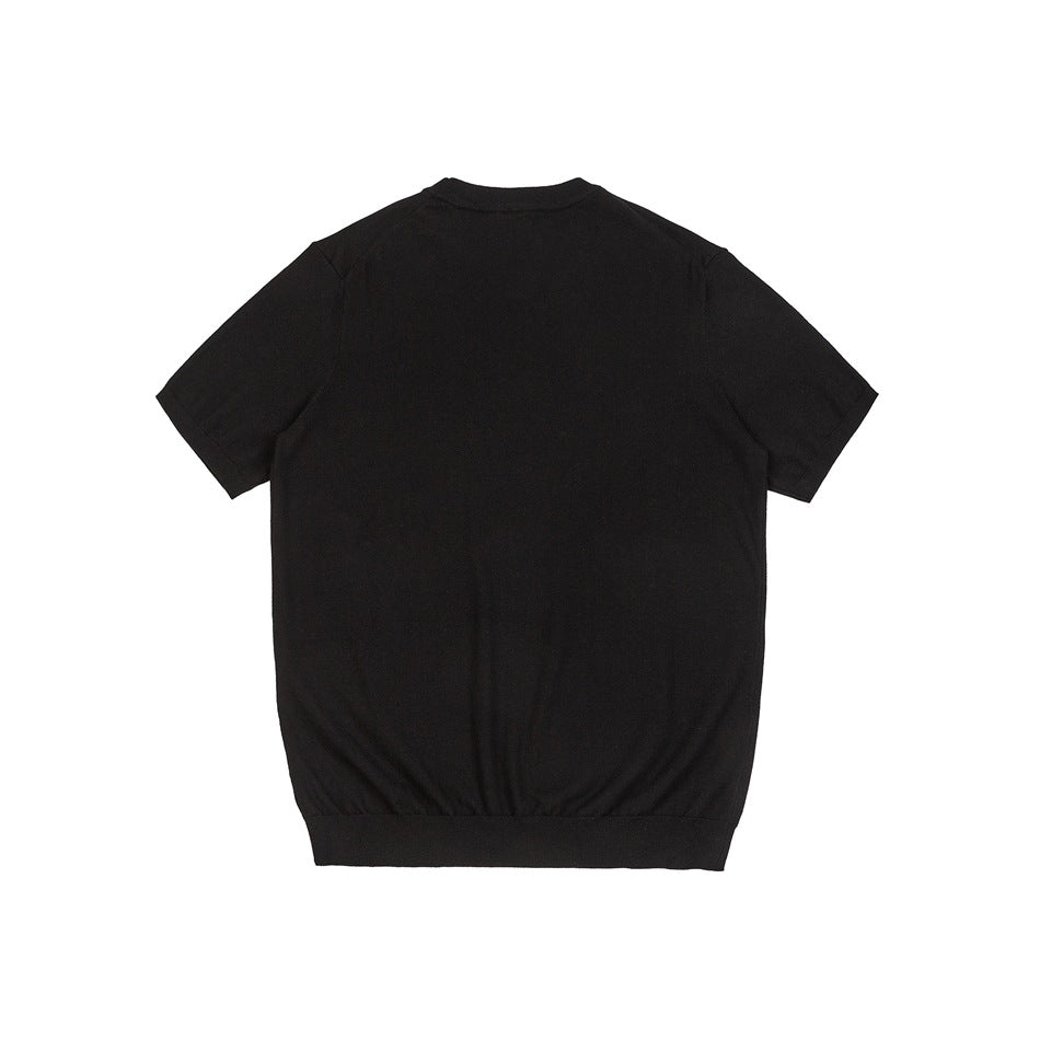 Back view of a black short-sleeve knit top with a crew neck and ribbed hem.