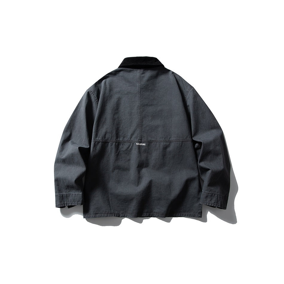 Back view of gray chore jacket with black corduroy collar, back yoke seam and small label at the center seam