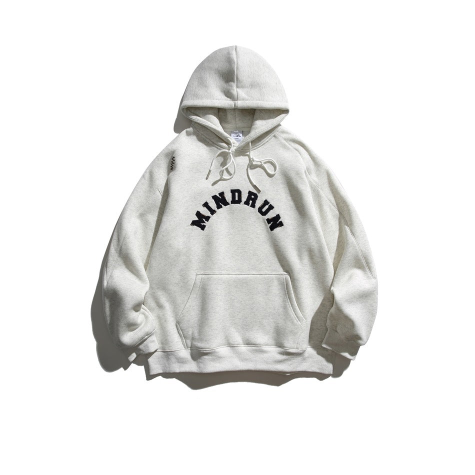 Front view of a light gray hooded sweatshirt with drawstrings, kangaroo pocket, and arched black lettering.