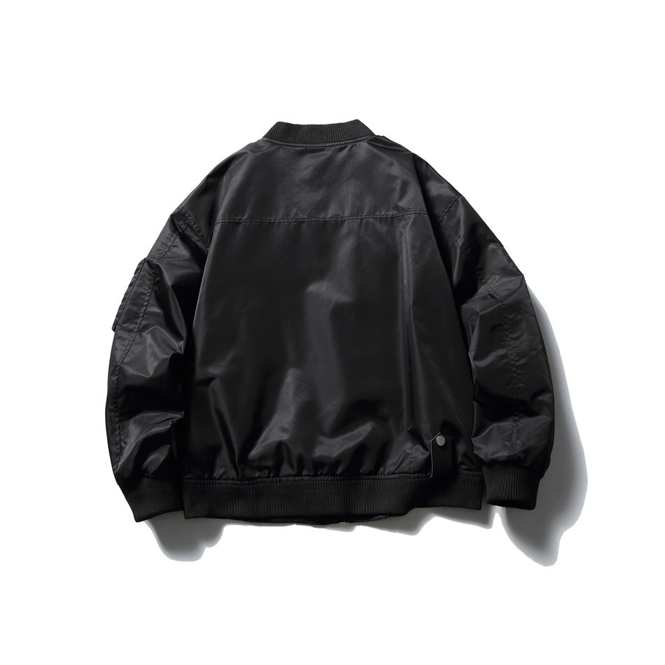 Back view of black bomber jacket with ribbed collar, cuffs and hem, upper back seam and a sleeve pocket