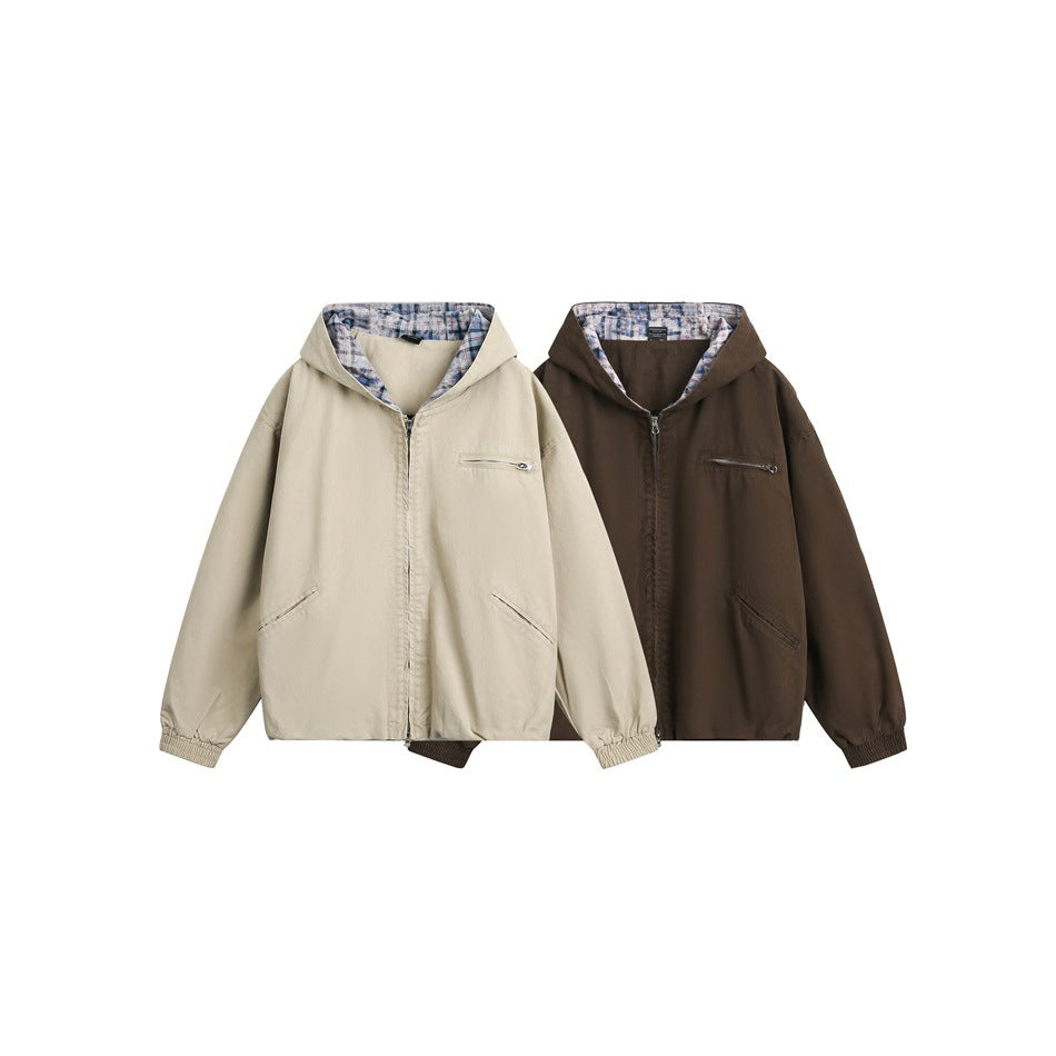 Front view of beige and dark brown hooded jackets with plaid-lined hoods, zip fronts, and pockets.