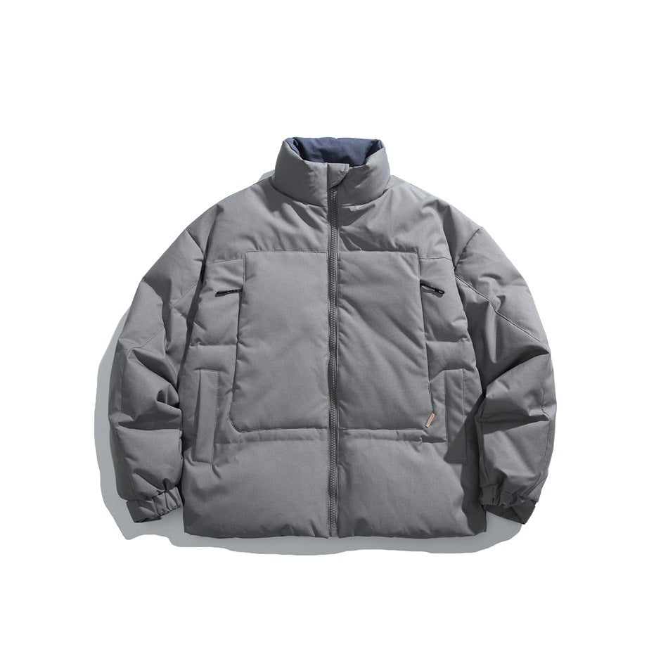 Gray quilted puffer jacket with stand collar, front zipper and chest panel, flat lay front view