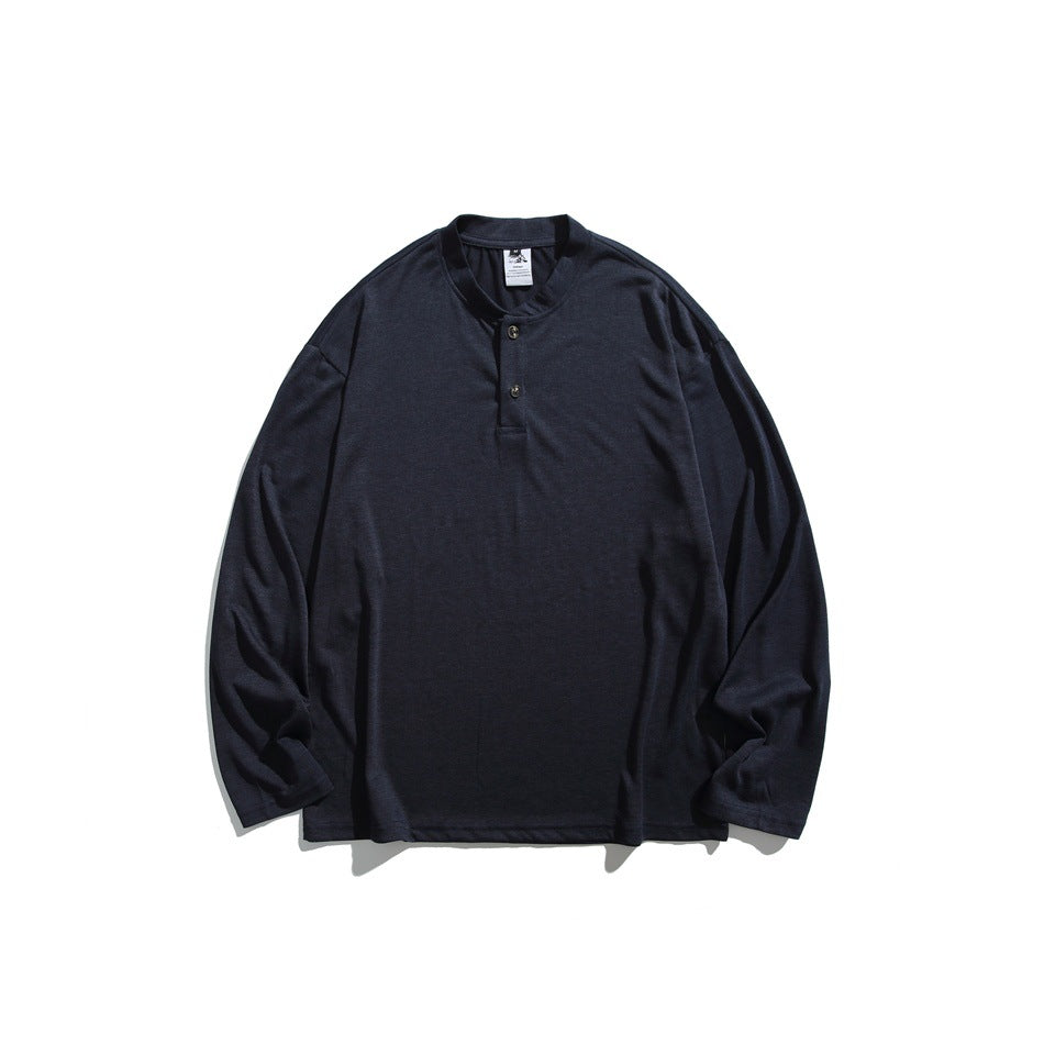 Navy long-sleeve henley top with stand collar and two-button placket, flat lay front view