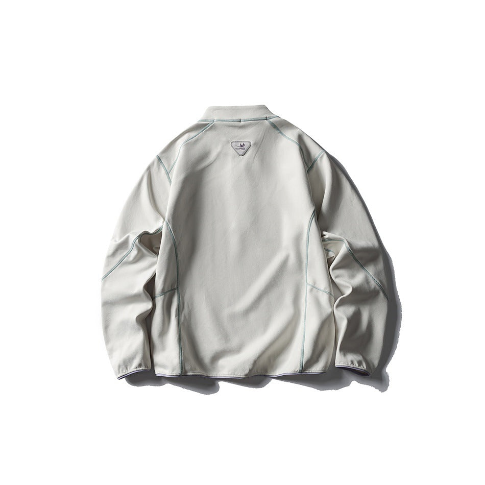 Back view of a light gray pullover with teal contrast seams and a small upper-back patch.