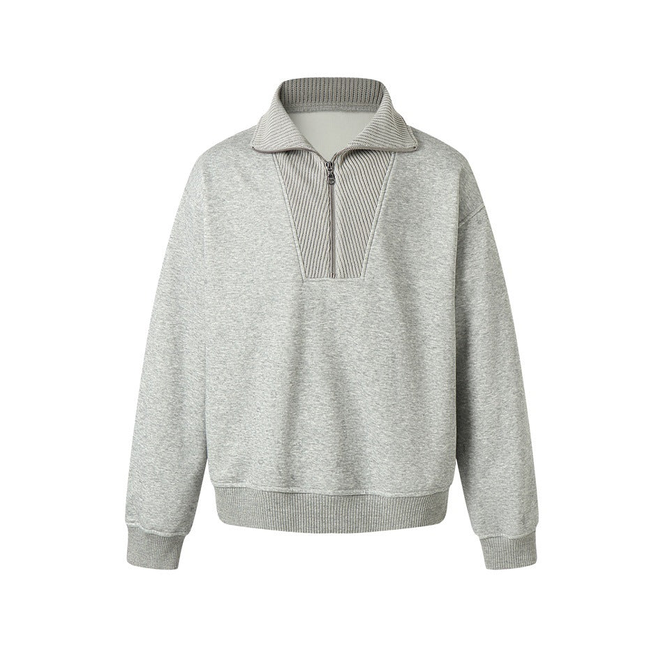 Heather gray half-zip sweatshirt with ribbed collar and placket panel, front flat view on white background