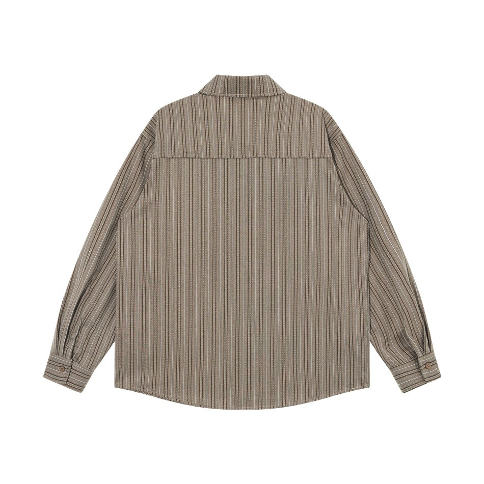 Back view of a taupe shirt with narrow vertical stripes, a shoulder yoke, and button cuffs.