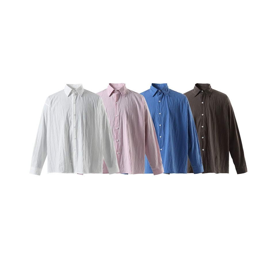 Four long-sleeve button-up shirts shown front-facing in white, pale pink, blue, and dark brown.
