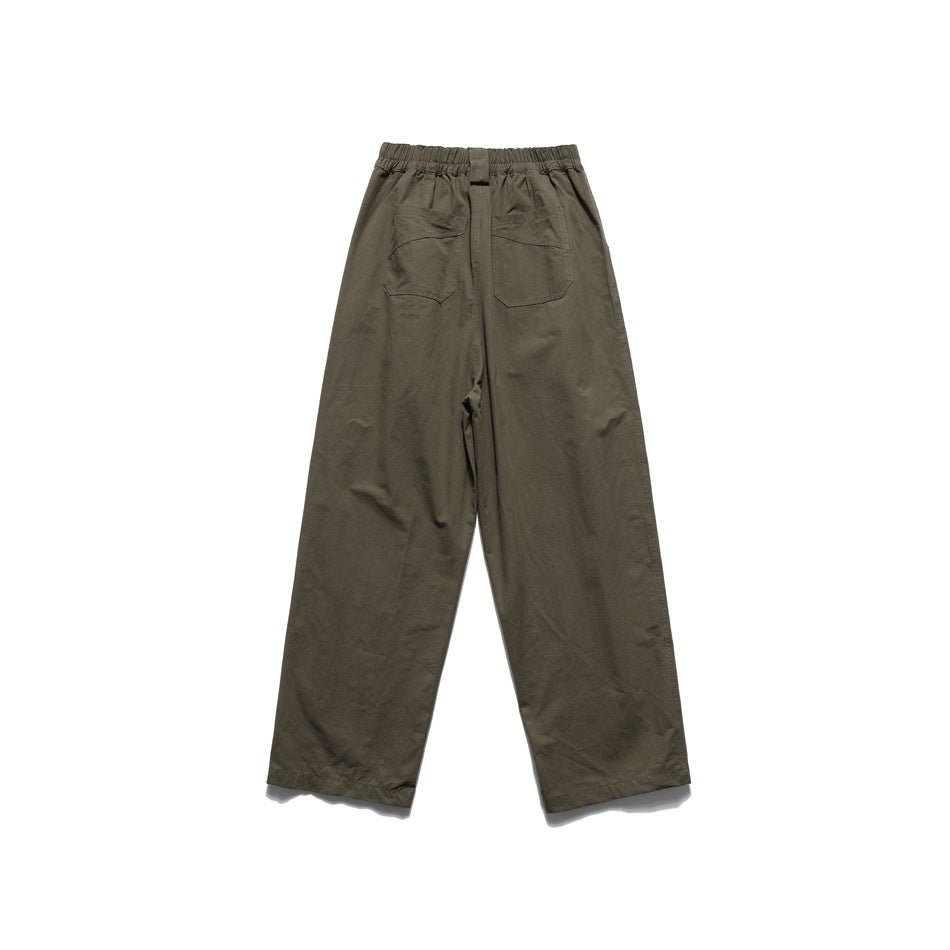 Back view of olive brown wide-leg pants with elastic waistband and two patch back pockets, flat lay