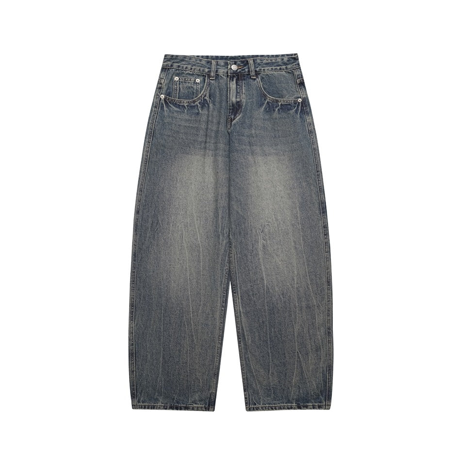 Vintage blue washed wide-leg men's jeans, flat front view with faded thighs and whisker creases