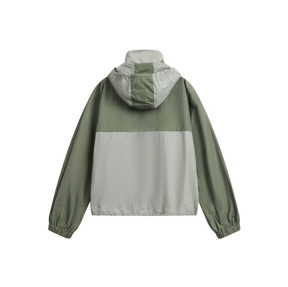 Back view of an olive and light gray color-block hooded jacket.