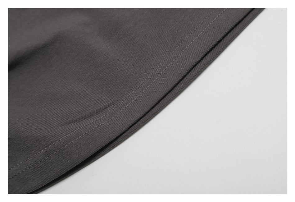 Close-up of the charcoal tank's double-stitched hem.