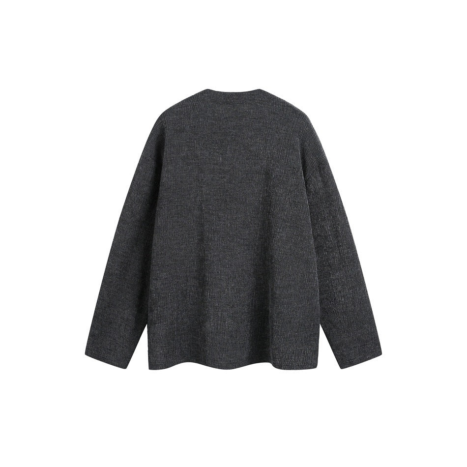 Back view of a charcoal gray long-sleeve top with a round neckline and relaxed fit.