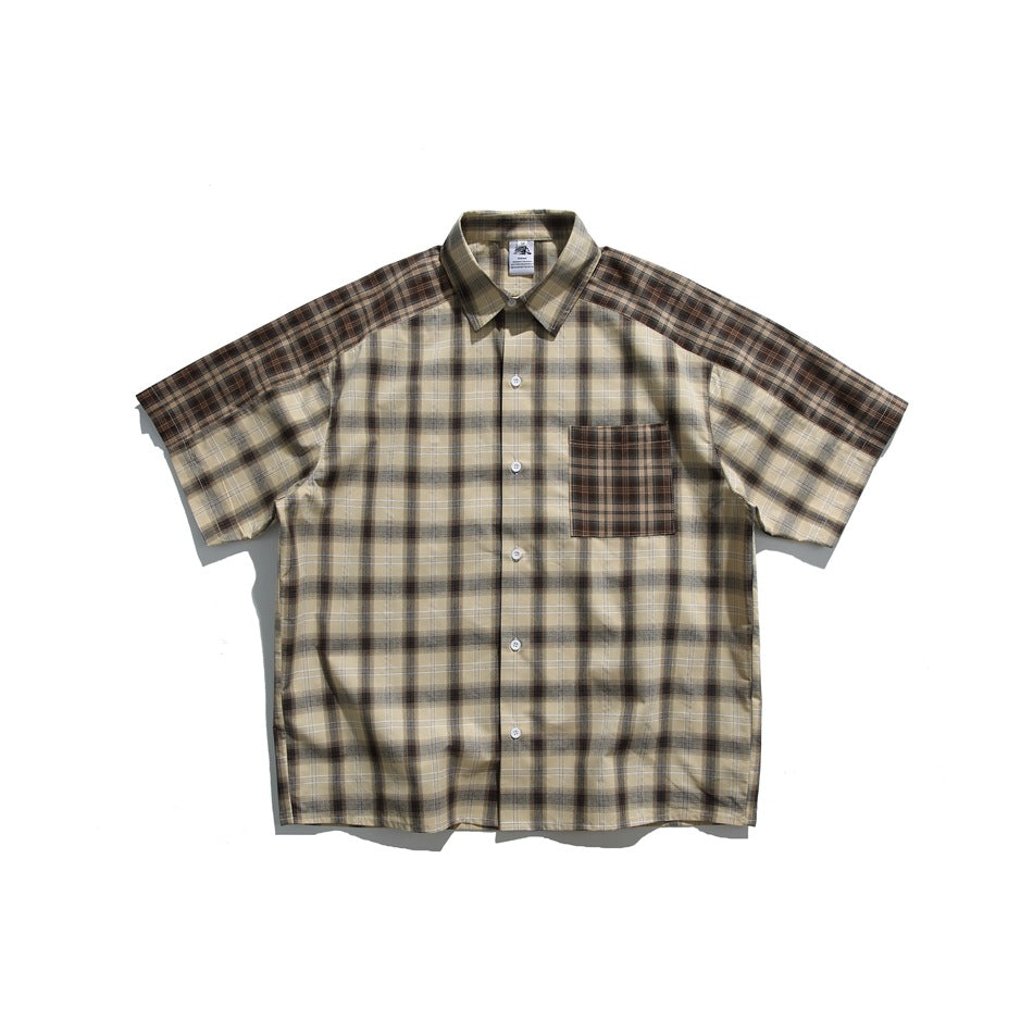Khaki and brown plaid short-sleeve button-up shirt flat lay, with contrast plaid shoulders and chest pocket