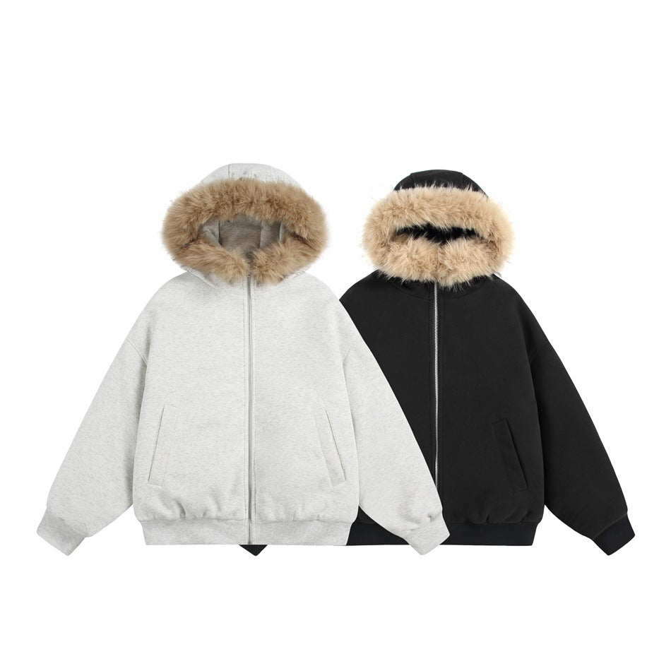 Front view of light gray and black zip-up hooded jackets with tan fur trim and front pockets.