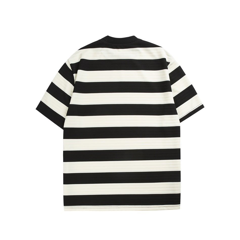 Back view of a short-sleeve T-shirt with wide black and off-white horizontal stripes.