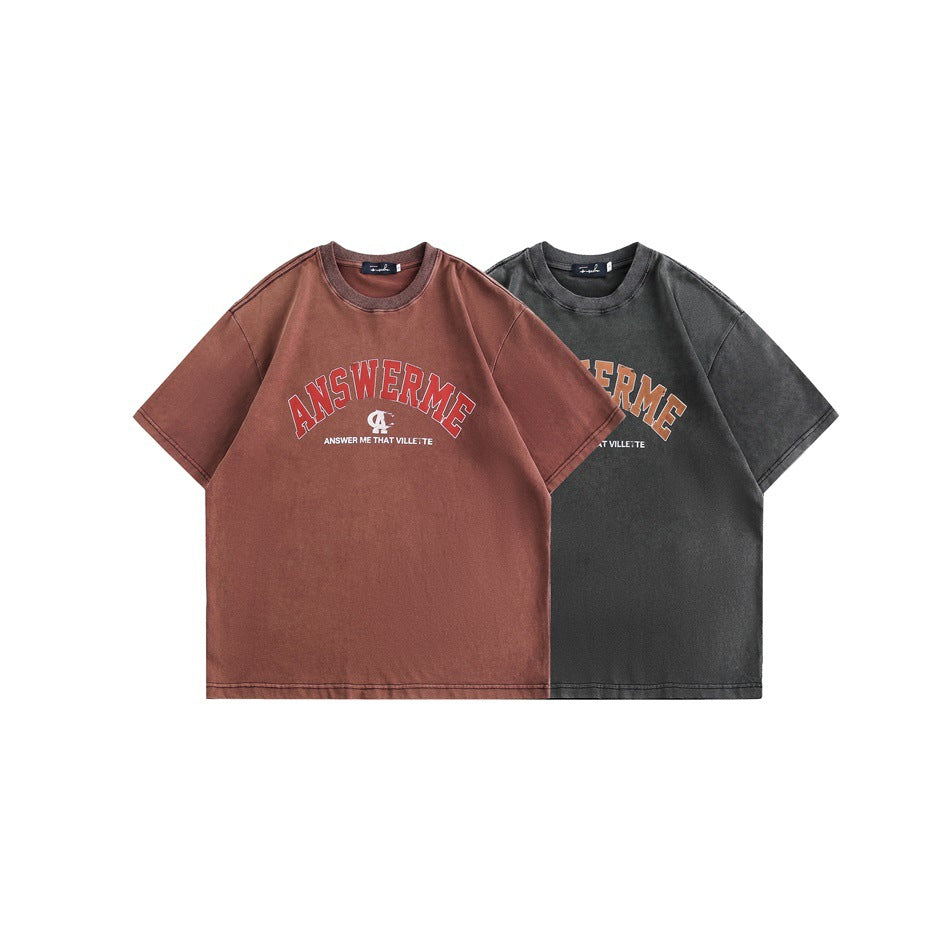 Two short-sleeve graphic T-shirts shown together in burgundy and charcoal gray.