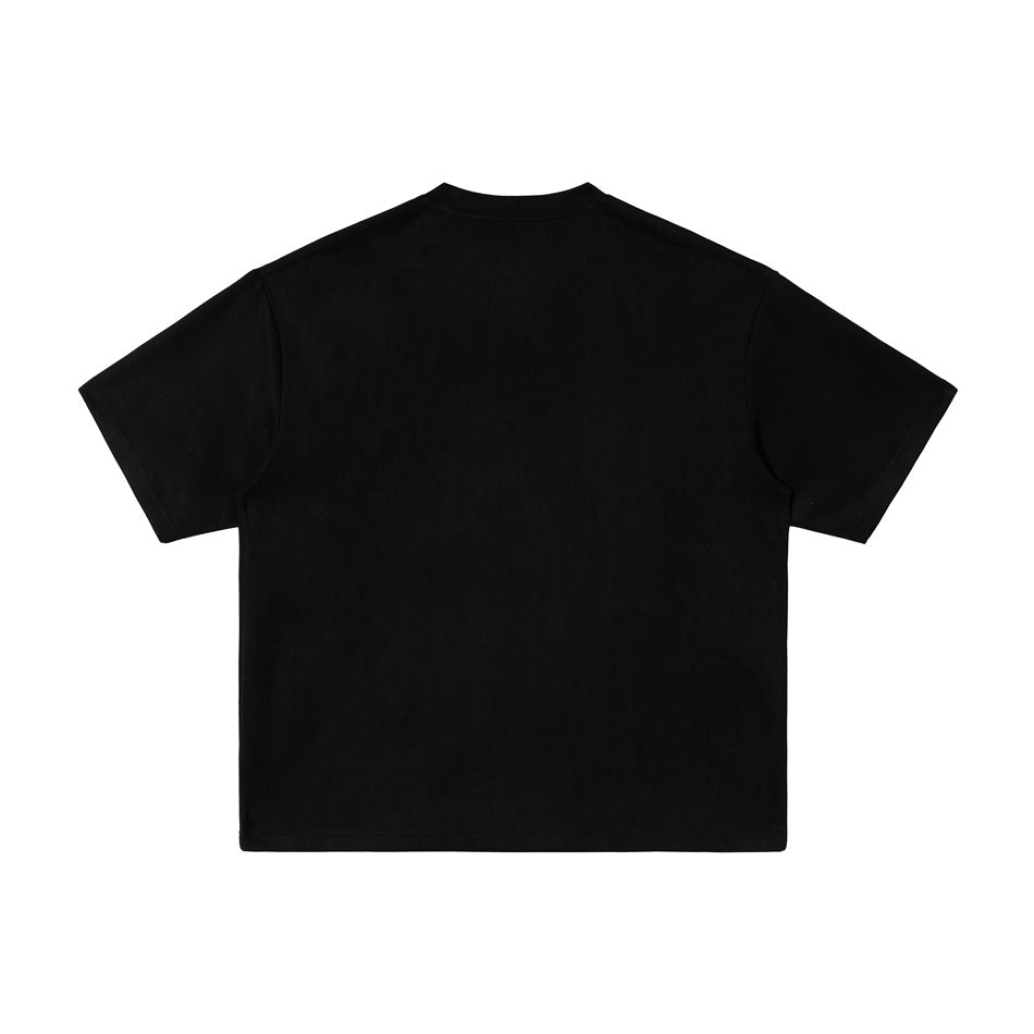 Back view of a plain black crew-neck short-sleeve T-shirt laid flat.