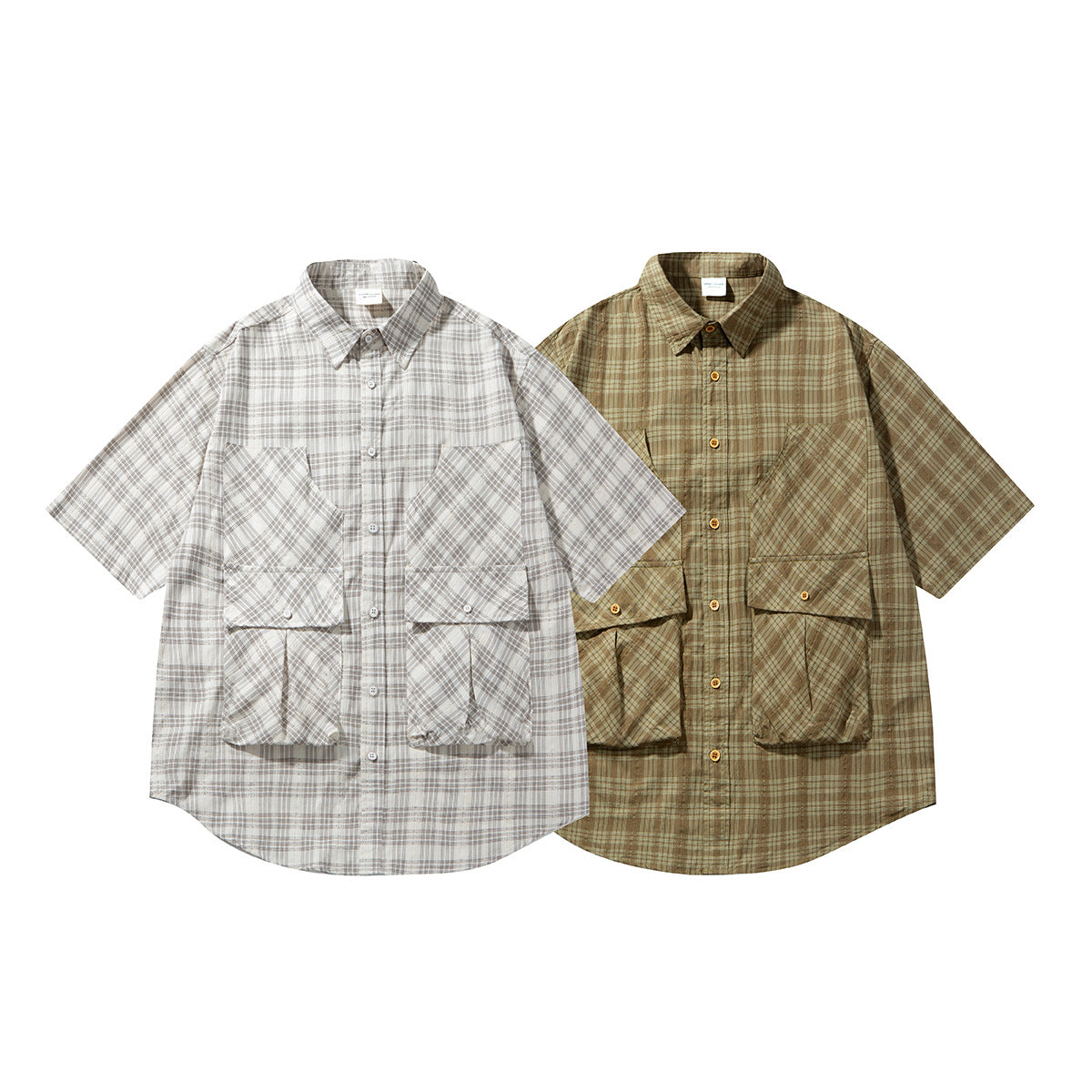 Two short-sleeve plaid button-up shirts with large front pockets, shown in light gray and olive brown.