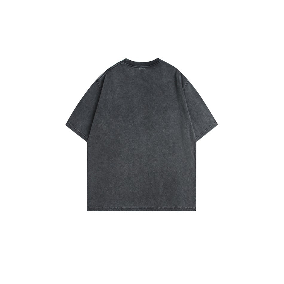 Back view of a washed black short-sleeve crew neck T-shirt with a plain back