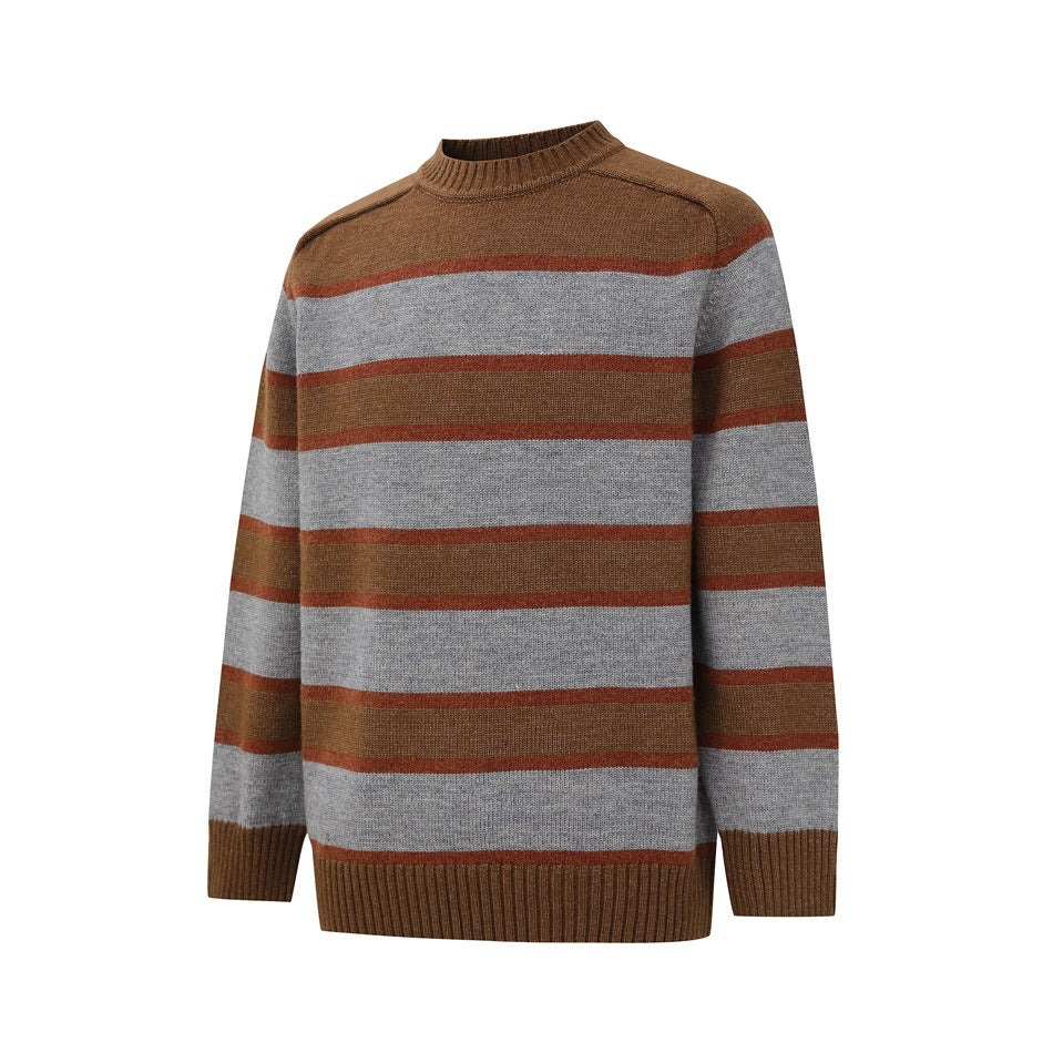 Angled view of brown and gray striped knit sweater with rust stripes, ribbed crew neck, cuffs and hem