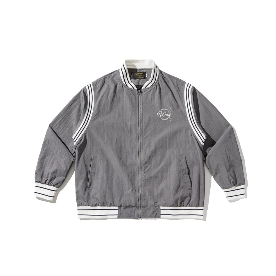 Gray zip-front bomber jacket with white striped collar, cuffs, hem and shoulder panels, flat lay
